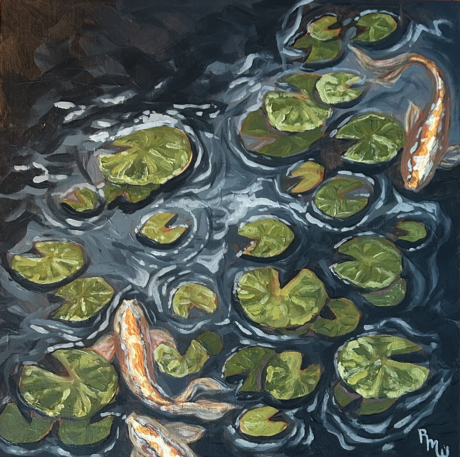 Koi among lily pads